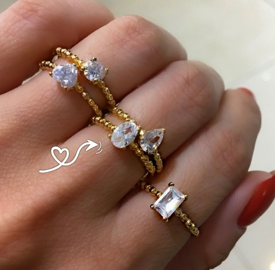 Anel Solitário com Zircônia Oval e Bolinha em Banho de Ouro