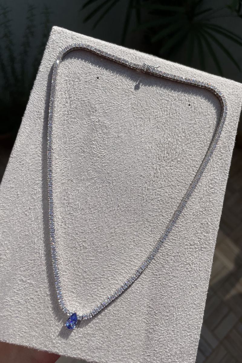 Riviera com Gota Tanzanita (Fecho Joia) em Ródio Branco