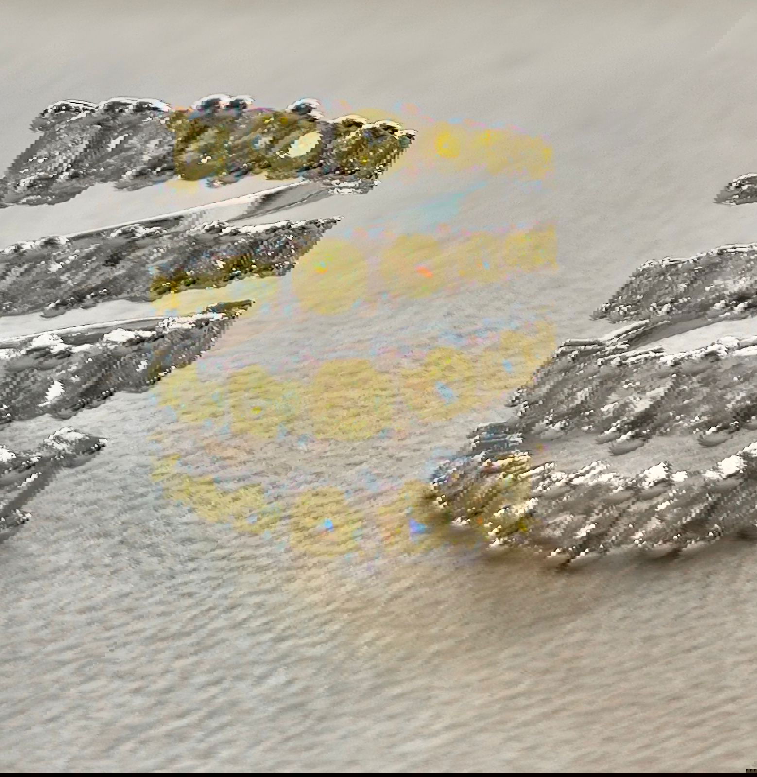 Anel Espiral com Zircônia Citrino em Banho de Ródio Branco