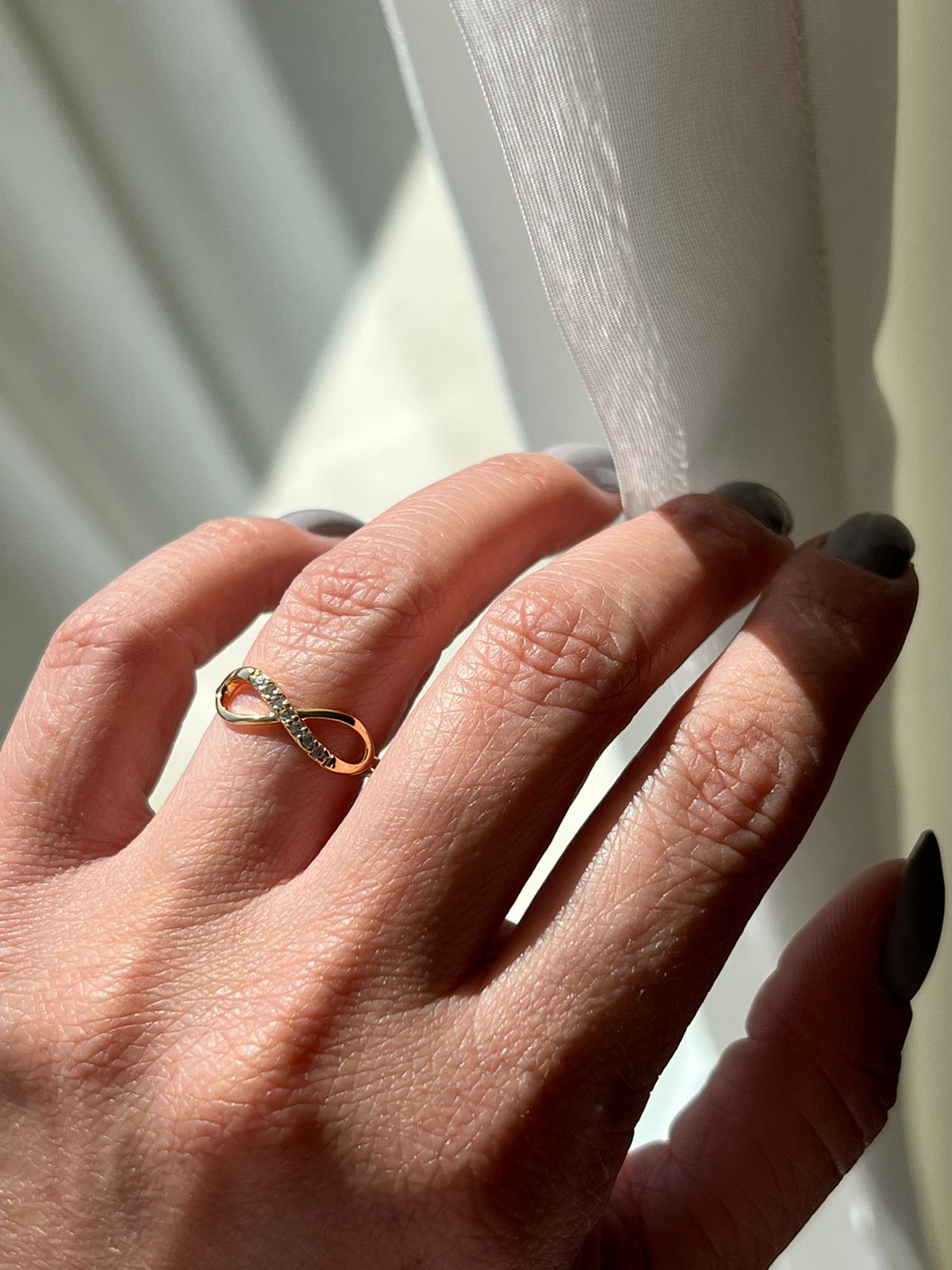Anel Infinito com Zircônia Cristal em Banho de Ouro