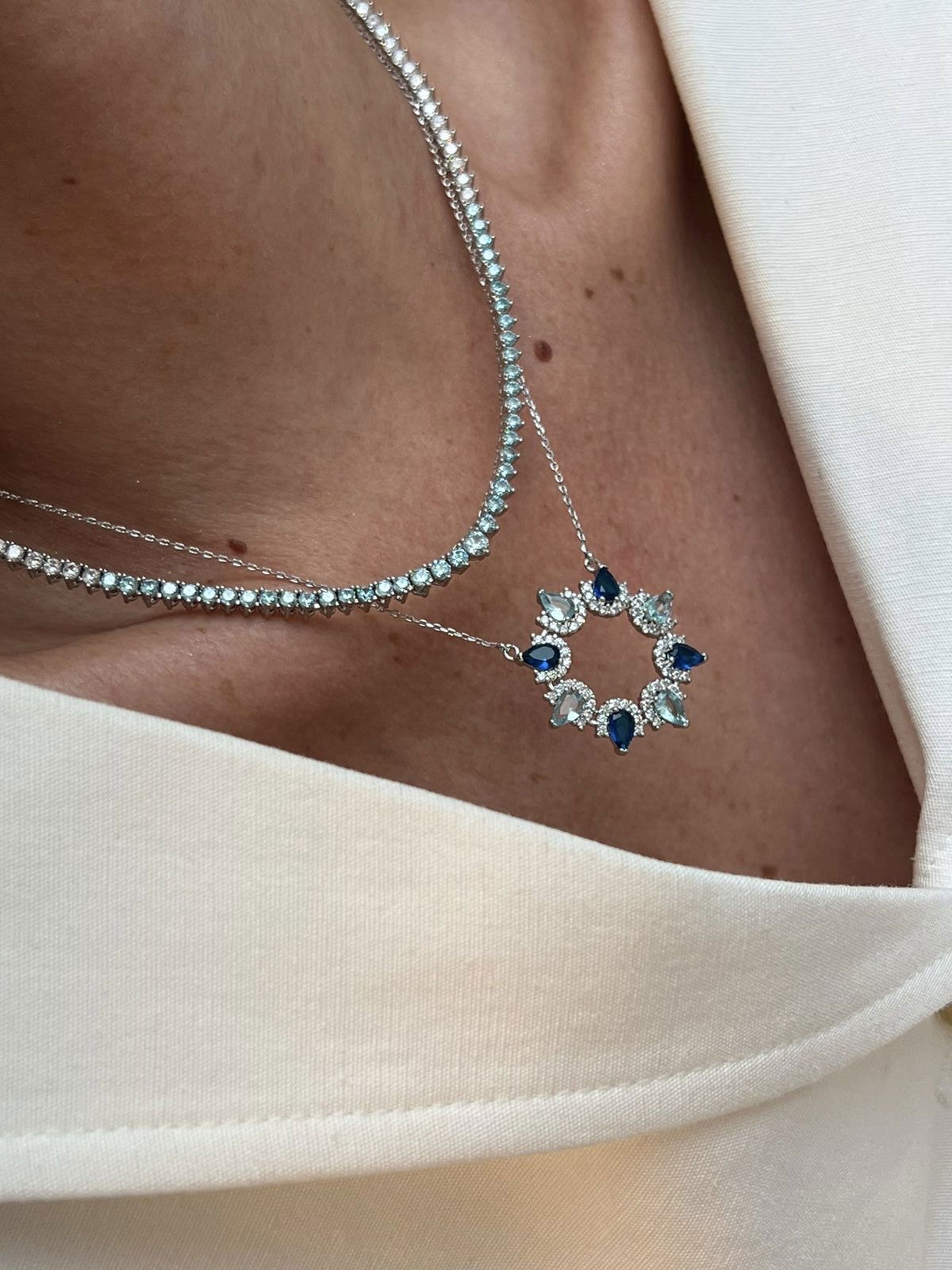 Riviera 3 pontas com Zircônia Cristal/Azul (FechoJoia) em Banho de Ródio Branco