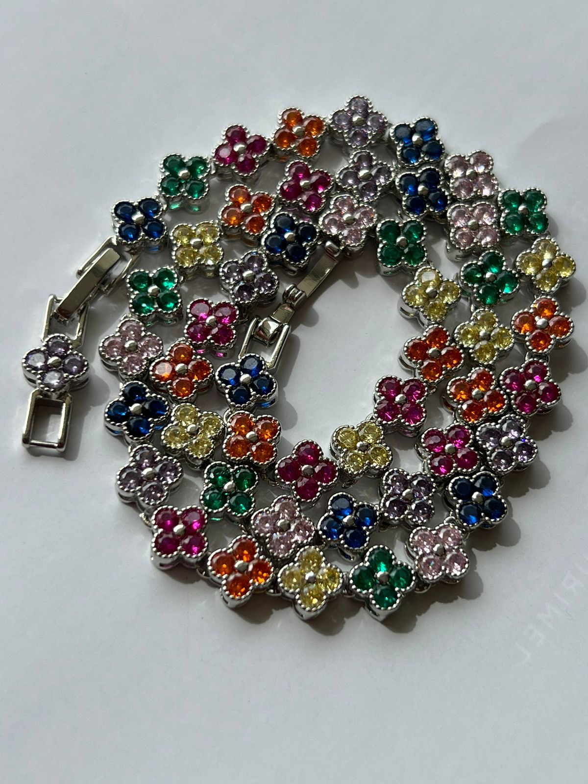 Riviera Maleável Trevo com Zircônia Colorida (Fecho Joia) em Banho de Ródio Branco